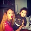 RiRi trägt jetzt lange, glatte Haare mit dunklem Ansatz