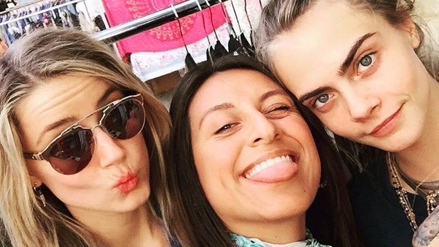 Amber Heard und Cara Delevingne mit Verkäuferin des Melrose Trading Post Market