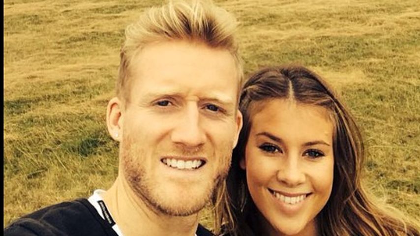 André Schürrle mit Montana Yorke im 2014 im Richmond Park in London