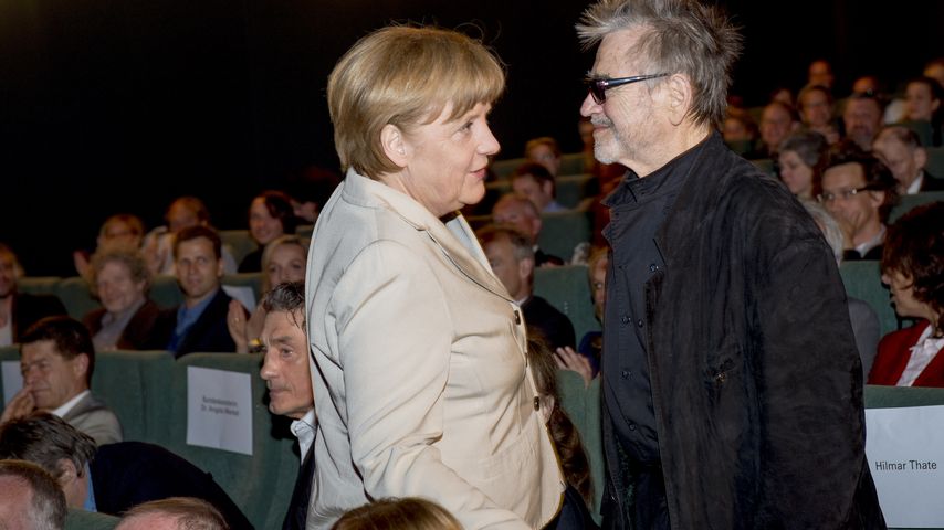 Angela Merkel und Hilmar Thate bei der Präsentation des Films "Die Legende von Paul und Paula" in Be