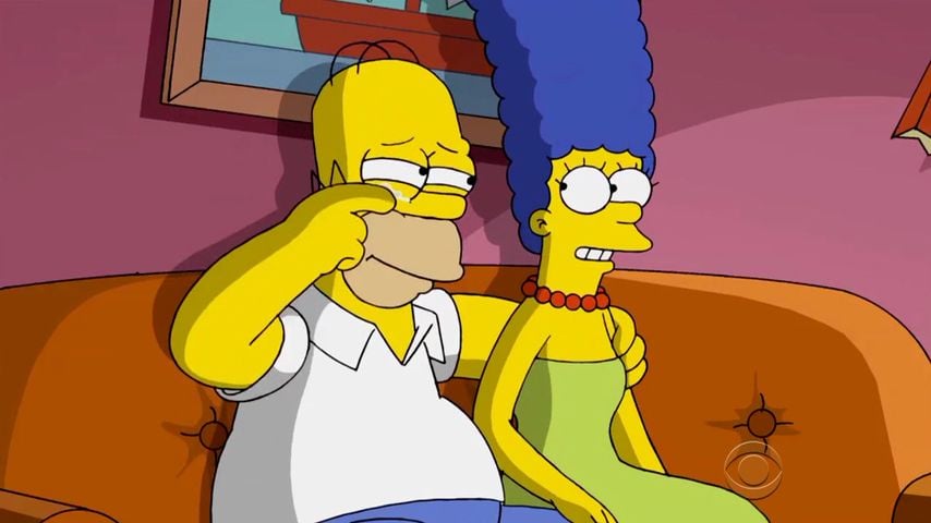 Homer und Marge sitzen auf der Couch