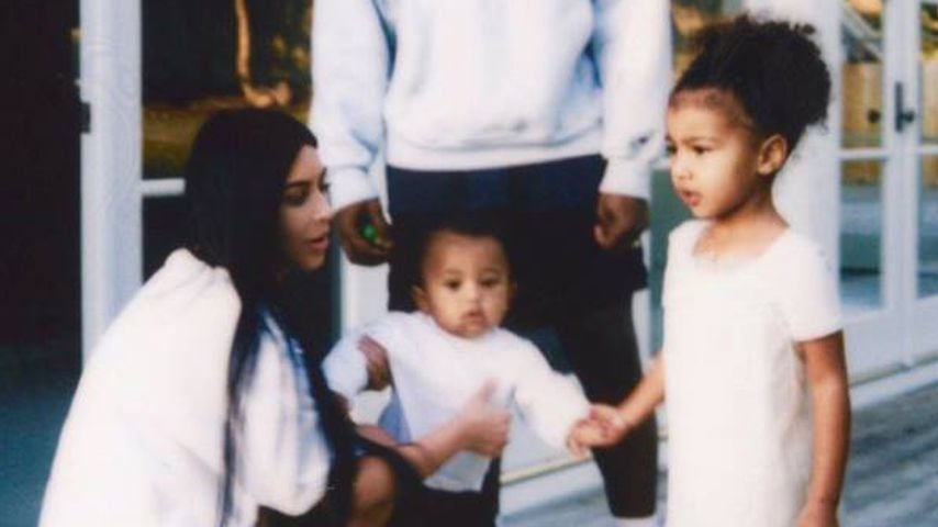Kim Kardashian und Kanye West mit ihren Kindern Saint und North West