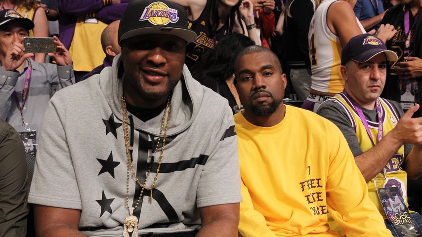 Lamar Odom und Kanye West bei einem Basketball-Spiel