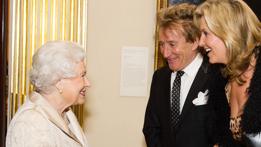 Queen Elizabeth II., Rod Stewart und Penny Lancaster in London