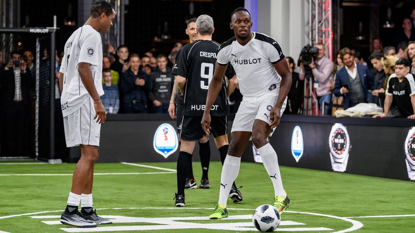 Usain Bolt (r.) bei einem Freundschaftsspiel in Basel