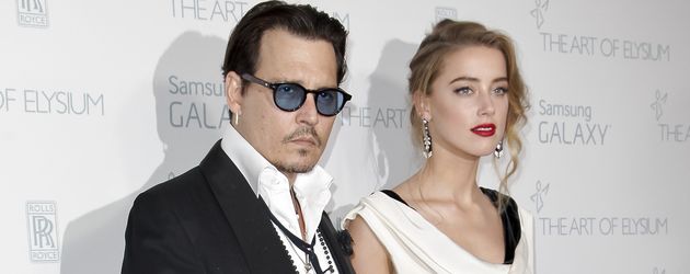 Johnny Depp und Amber Heard auf dem Red Carpet Johnny Depp und Amber Heard auf dem Red Carpet